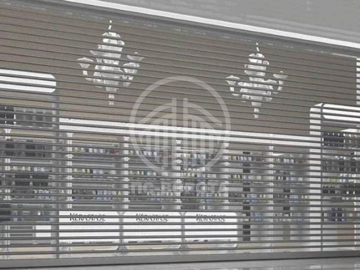 рулонные ворота с заполнением из перфорированного профиля